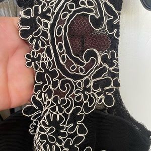 Aidan Mattox black lace embroidered cap sleeve dress. Size 6.